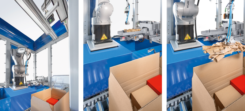 Ein Papierpolster wird vollautomatisch in einen Karton mit Versandgütern gelegt.